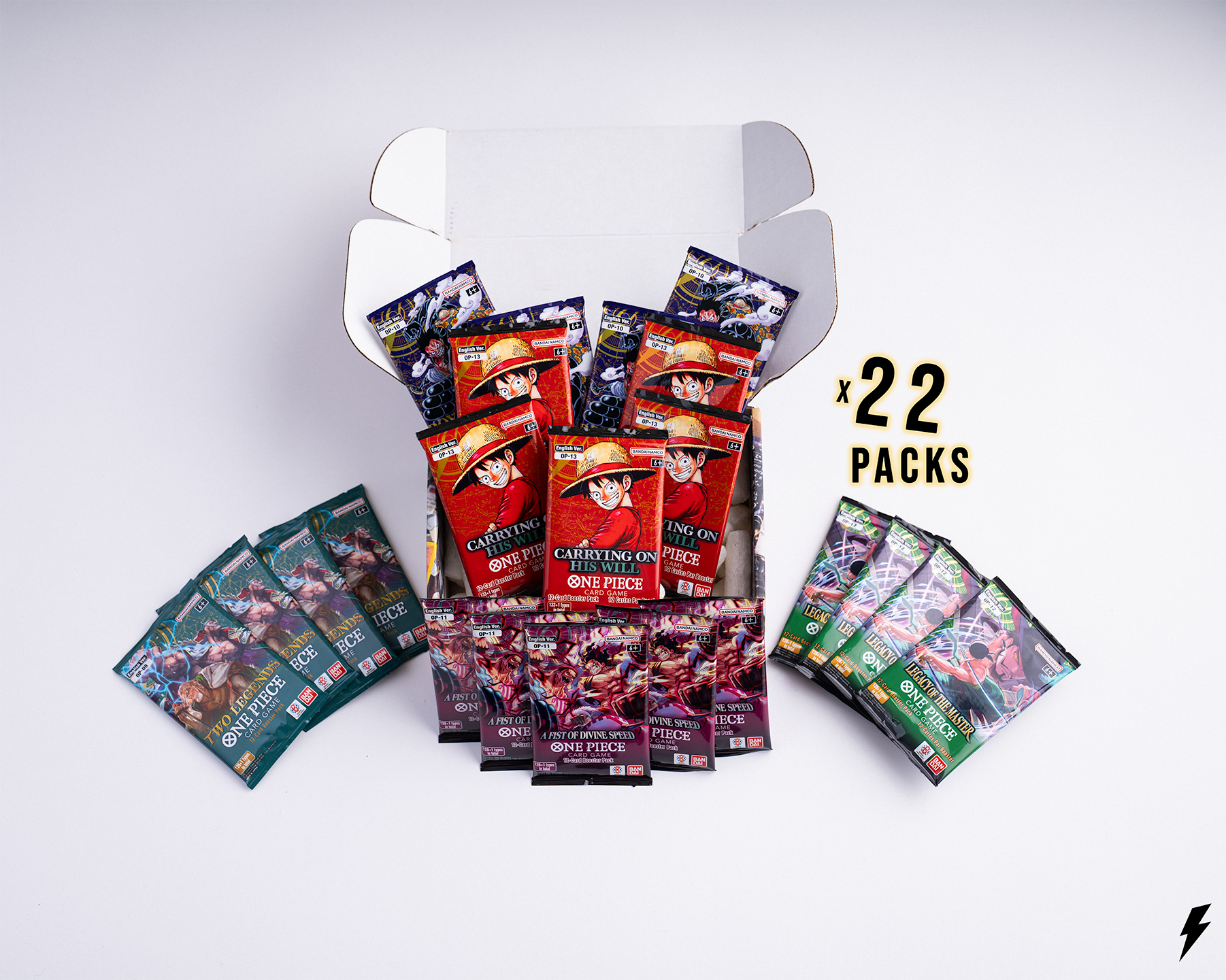 Open Booster Crate box containing 22 One Piece booster packs from mixed sets, including Carrying On His Will, Legacy of the Master, and A Fist of Divine Speed, displayed with “x 22 Packs” text on the right.